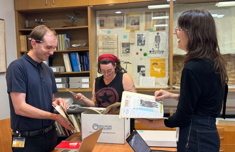 iSchool students Alena Karkanias (MLIS ‘17), Karl Grunwald (MARA ‘17) and Elise Mills (MLIS ‘17). 