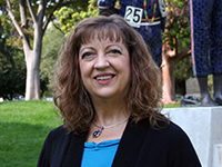 photo of Wynn Schultz-Krohn by SJSU statues photo of Wynn Schultz-Krohn by SJSU statues of Tommy Smith and Juan Carlos