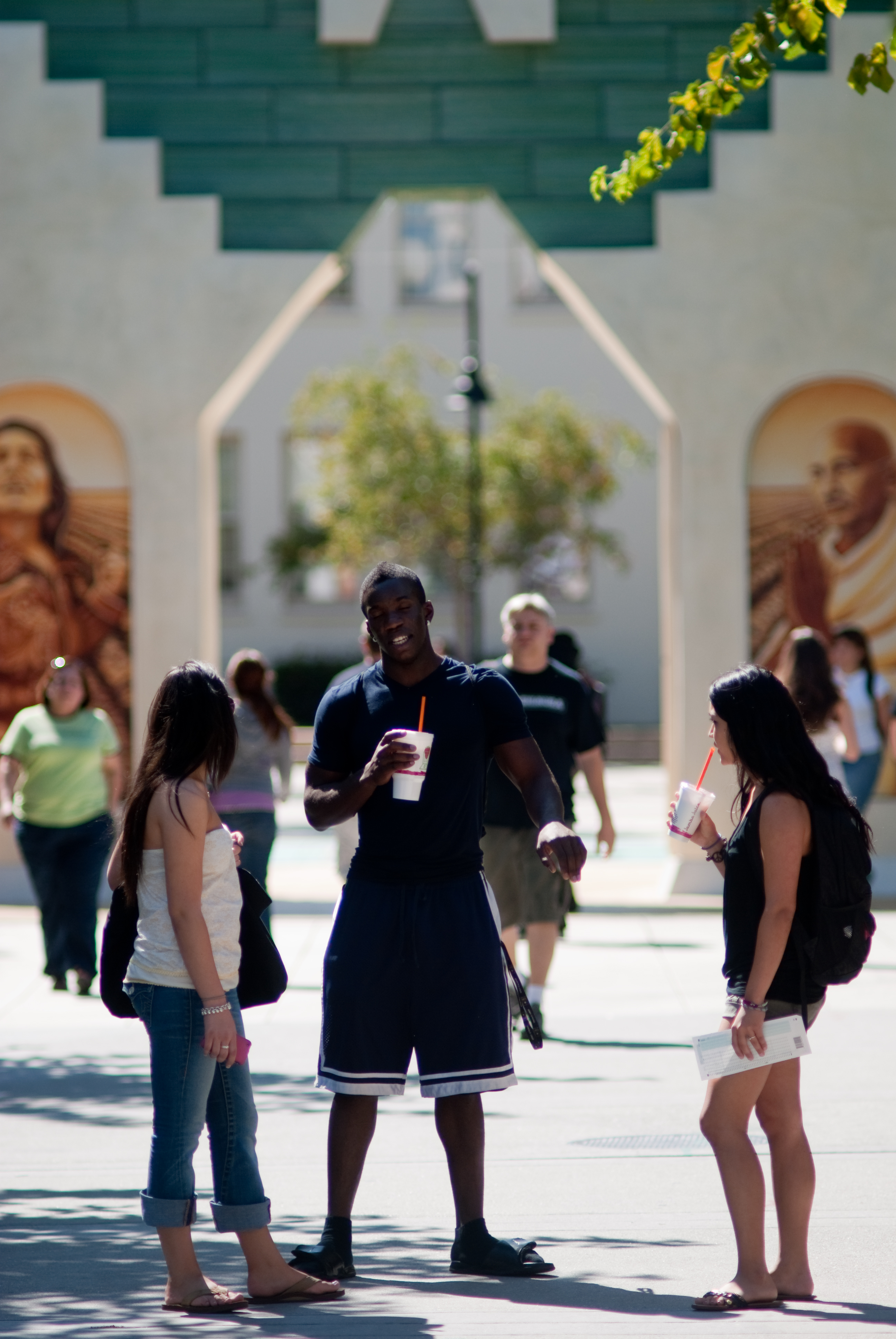 sjsu students conversing in front of Cesar Chavez plaza sjsu students conversing in front of Cesar Chavez plaza