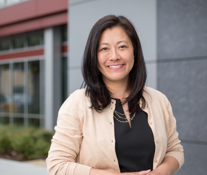 Graduate Program Coordinator smiling