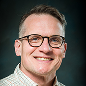 headshot of Joshua Baur